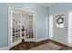 Welcoming foyer with elegant glass doors and beautiful hardwood floors that create a grand entrance at 80 Ingle View Ct, Burlington, NC 27215
