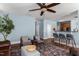Spacious living area with plush seating, patterned rug, and warm lighting at 80 Ingle View Ct, Burlington, NC 27215