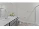 Bathroom featuring vanity with gray cabinets, a white sink, and tiled floors at 978 Gateway Commons Cir, Wake Forest, NC 27587