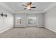 Bright bedroom features plush carpet, recessed lighting, double windows and pre-wiring for a TV at 978 Gateway Commons Cir, Wake Forest, NC 27587