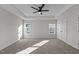 Bright bedroom with recessed lighting, carpeted floor, and a dual window offers a serene atmosphere at 978 Gateway Commons Cir, Wake Forest, NC 27587