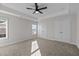 Spacious bedroom features plush carpet, recessed lighting, dual window and double door closet at 978 Gateway Commons Cir, Wake Forest, NC 27587