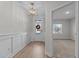 Foyer featuring light wood floors, a pendant light, and entry to another room at 978 Gateway Commons Cir, Wake Forest, NC 27587