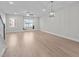 Spacious living room with large windows and modern flooring at 978 Gateway Commons Cir, Wake Forest, NC 27587