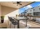 Outdoor patio with table, chairs, and a view of the backyard at 978 Gateway Commons Cir, Wake Forest, NC 27587