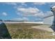 Large backyard with a white fence and a view of the sky above at 98 Denning Farms Ln, Benson, NC 27504