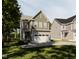Charming two-story home with a 2-car garage and beautifully maintained lawn at 1032 Harper Rd, Raleigh, NC 27603