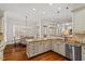 Bright kitchen featuring granite countertops and hardwood floors and a dining area at 105 Jessfield Pl, Cary, NC 27519