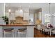 Charming kitchen with wood island, breakfast bar, and hardwood floors at 105 Jessfield Pl, Cary, NC 27519