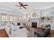 Inviting living room features a fireplace, built-ins, and bright windows at 105 Jessfield Pl, Cary, NC 27519