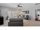 Cozy living room featuring an oversized window and a comfortable seating arrangement at 105 Jessfield Pl, Cary, NC 27519