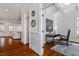Office area showcasing a desk, chair, and a peek into the living room, creating a versatile workspace at 105 Jessfield Pl, Cary, NC 27519
