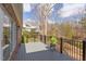Spacious deck with black railings and views of the surrounding trees at 105 Wicklow Pl, Chapel Hill, NC 27517