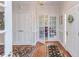 Inviting foyer with hardwood floors and views of dining room at 105 Wicklow Pl, Chapel Hill, NC 27517