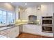 Beautiful kitchen featuring updated appliances, countertops and backsplash at 105 Wicklow Pl, Chapel Hill, NC 27517