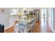 Open kitchen with large island, granite countertops and stainless-steel appliances at 105 Wicklow Pl, Chapel Hill, NC 27517