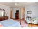 Spacious main bedroom with hardwood floors, comfortable furnishings and natural light at 105 Wicklow Pl, Chapel Hill, NC 27517