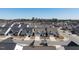 A wide shot of a neighborhood of single-Gathering homes each with a two-car garage and small front lawn at 106 Ivory Ln, Raleigh, NC 27610