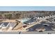 An aerial view of the community clubhouse, pool, tennis courts, and a well-maintained parking lot at 106 Ivory Ln, Raleigh, NC 27610