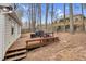Backyard deck with outdoor dining furniture, perfect for enjoying the outdoors at 107 Fishers Creek Ct, Cary, NC 27513
