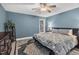 Comfortable bedroom featuring a neutral color palette and ceiling fan at 107 Fishers Creek Ct, Cary, NC 27513