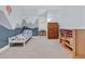 room features blue accent wall with hot air balloons and mountain range at 107 Fishers Creek Ct, Cary, NC 27513