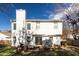 Large backyard features a white home with a brick grill and an outdoor seating area at 11 Marsh Landing Ct, Durham, NC 27703