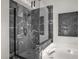 Luxury bathroom featuring a marble shower with glass enclosure and a deep soaking tub at 11 Marsh Landing Ct, Durham, NC 27703