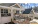 Spacious home with a welcoming front porch, brick accents, and attached garage at 112 Rawhide Dr, Louisburg, NC 27549