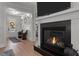 Cozy living room with a modern fireplace and a view of the entryway at 112 Rawhide Dr, Louisburg, NC 27549
