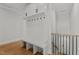 Mudroom features built-in cubbies with hooks and cabinets for optimal storage, perfect for an organized entryway at 112 Rawhide Dr, Louisburg, NC 27549