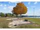Community horseshoe pits and lake access provide recreational opportunities for homeowners at 112 Rawhide Dr, Louisburg, NC 27549