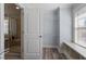 Bathroom featuring a glass shower, storage, and a linen closet at 1135 Rosepine Dr, Cary, NC 27519