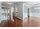 Bright and airy living room with beautiful hardwood floors, and modern lighting at 1135 Rosepine Dr, Cary, NC 27519