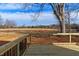 The back deck of this property offers an amazing view of the surrounding acreage at 1403 Antioch Church Rd, Timberlake, NC 27583