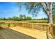 Inviting back deck overlooking large, level yard and mature trees, perfect for outdoor entertaining at 1403 Antioch Church Rd, Timberlake, NC 27583