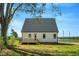 Expansive backyard featuring a deck and plenty of room for outdoor activities at 1403 Antioch Church Rd, Timberlake, NC 27583