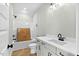 Clean bathroom with a white vanity, modern fixtures, and a combination tub and shower at 1403 Antioch Church Rd, Timberlake, NC 27583