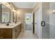 Spacious bathroom with double vanity, modern fixtures, and bright, airy design at 1403 Antioch Church Rd, Timberlake, NC 27583