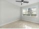 Comfortable bedroom offering scenic views and a ceiling fan for added comfort at 1403 Antioch Church Rd, Timberlake, NC 27583