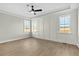 Bright and airy bedroom with tray ceiling and large windows at 1403 Antioch Church Rd, Timberlake, NC 27583