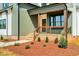 Inviting front porch with wooden accents, creating a warm and welcoming entrance at 1403 Antioch Church Rd, Timberlake, NC 27583