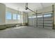 Spacious garage with lots of natural light and high ceilings offers plenty of storage at 1403 Antioch Church Rd, Timberlake, NC 27583