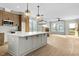 Spacious kitchen with large island, wood cabinets and stainless steel appliances at 1403 Antioch Church Rd, Timberlake, NC 27583