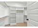 Walk-in closet with custom shelving and rod system at 1403 Antioch Church Rd, Timberlake, NC 27583