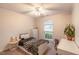 Well-lit bedroom features a comfy bed, neutral walls and large windows that allow natural light to enter at 200 Lindell Dr, Apex, NC 27539