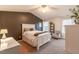 Comfortable bedroom with neutral colors, soft carpet, and natural light at 200 Lindell Dr, Apex, NC 27539