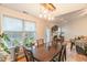 Cozy dining room with pendant lights, wooden table, and views to the Gathering room at 200 Lindell Dr, Apex, NC 27539