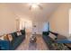 Spacious living room with hardwood floors, comfortable seating, and natural light at 200 Lindell Dr, Apex, NC 27539