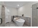 Modern bathroom featuring a freestanding soaking tub and updated fixtures for a luxurious feel at 2108 Rangecrest Rd, Raleigh, NC 27612